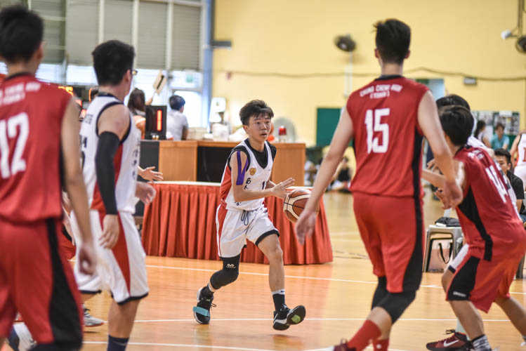 Bryan Ong (NCH #17) dribbling the ball during the North Zone B Division basketball match between Chung Cheng High and Nan Chiau High School. (Photo © Stefanus Ian/Red Sports)