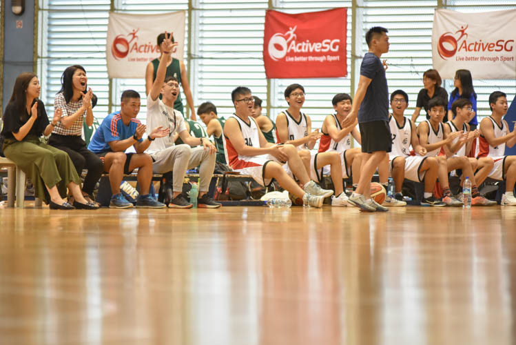 Hougang secondary school cheering for their team during the North Zone B Division basketball match between Hougang secondary and Woodgrove secondary. (Photo  © Stefanus Ian/Red Sports)