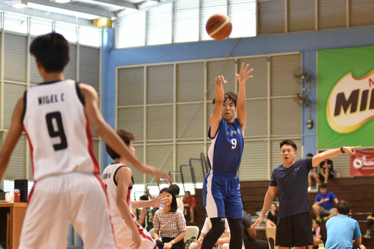 Chen Pengkun (WG #9) taking a shot during the North Zone B Division basketball match between Hougang secondary and Woodgrove secondary. (Photo  © Stefanus Ian/Red Sports)