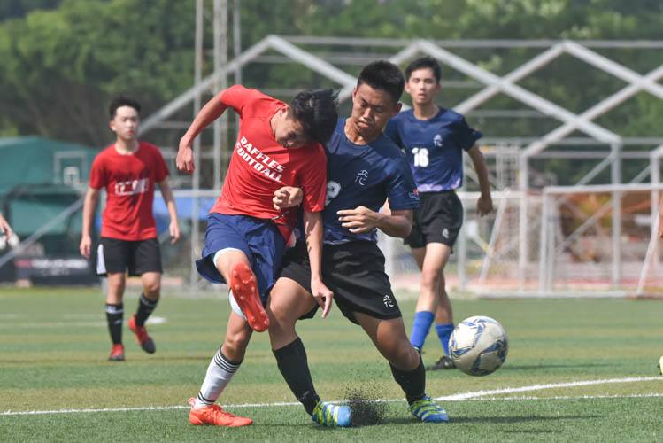 A Raffles Institution player (in red) taking a shot during a NYSI JC League match between Raffles Institution and River Valley High School. (Photo © Stefanus Ian/Red Sports)