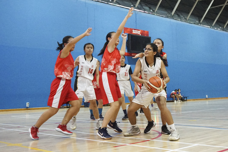 Richa (JSS #11) attacking the basket during the West zone B division basketball match between Jurong Secondary School and River Valley High School. (Photo 3 © Pang Chin Yee/REDintern)