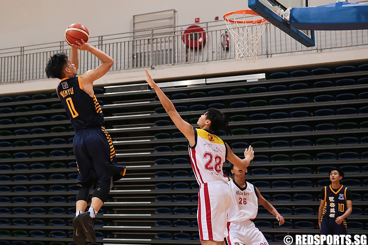Tan Wen Yu (#0) of St. Andrew's shoots against (#22) of ACS (Barker). (Photo 9 © Lee Jian Wei/Red Sports)