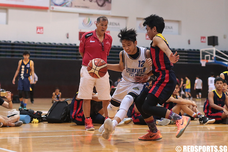 Russell Lim (#12) of Fairfield Methodist drives against Panca (#15) of ACS (Barker). (Photo 3 © Lee Jian Wei/Red Sports)