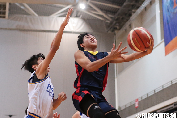 Panca (#15) of ACS (Barker) goes for the layup against Russell Lim (#12) of Fairfield Methodist. (Photo 9 © Lee Jian Wei/Red Sports)