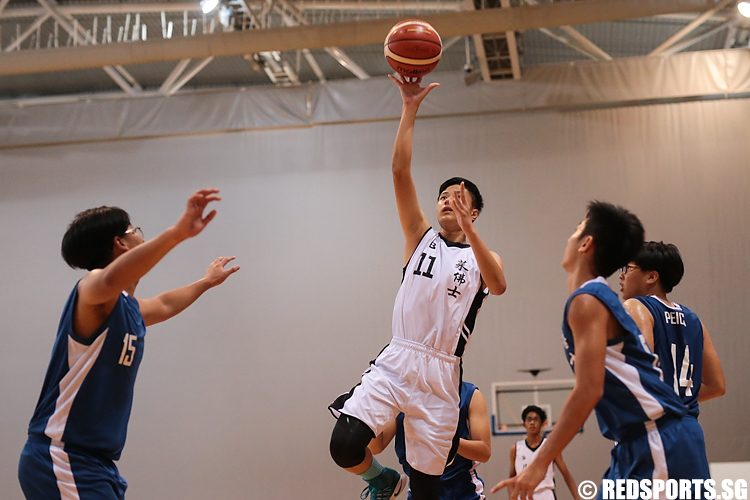 (#11) of Raffles Institution shoots against Pei Cai Secondary. (Photo 2 © Lee Jian Wei/Red Sports)