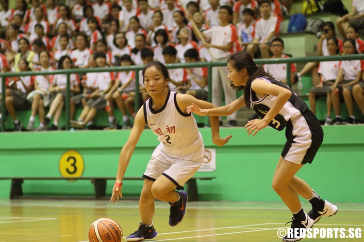 Rachel Tan (NJC #2) drives to the hoop. She scored a team-high 12 points in the victory over RGS. (Photo 2 © Dylan Chua/Red Sports