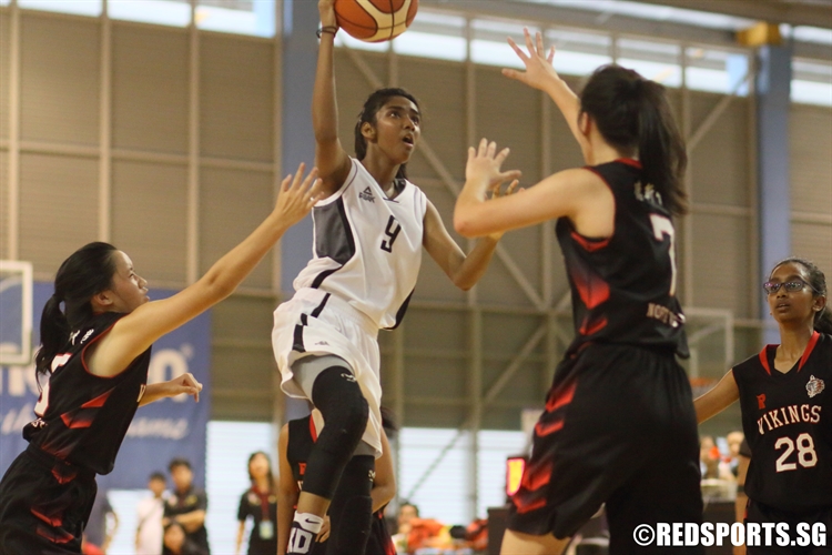 Crystal Nathasha (SCGS #9) rises for a lay-up. She scored a game-high 21 points to lead SCGS in the final. (Photo 1 © Dylan Chua/Red Sports)
