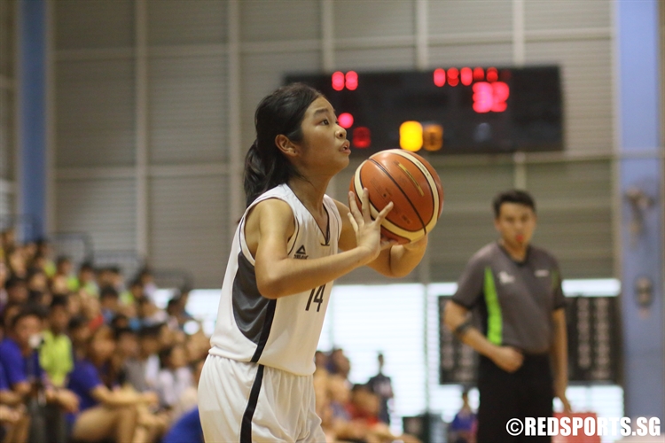 Alisa Sarah Bte Jefri (SCGS #14) takes aim from three-point land. (Photo 4 © Dylan Chua/Red Sports)