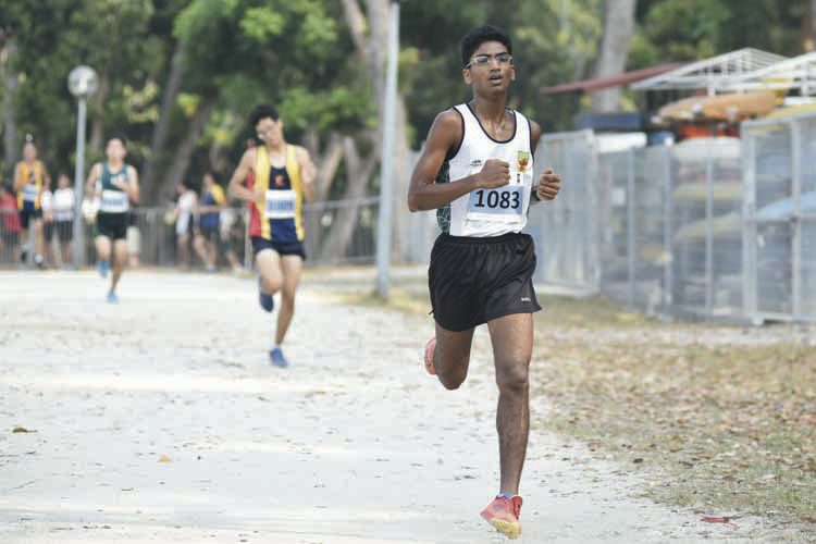 Nedunchezian Selvageethan (#1083) of Raffles Institution came in twelfth with a timing of 17:21 in the A Division Boys. (Photo © Eileen Chew/Red Sports)