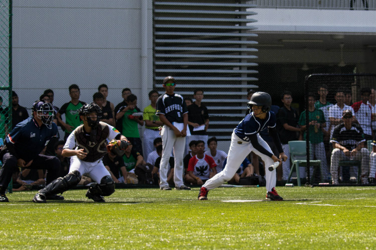 Audric Chia (RI #3) ready to fire at 2nd base 