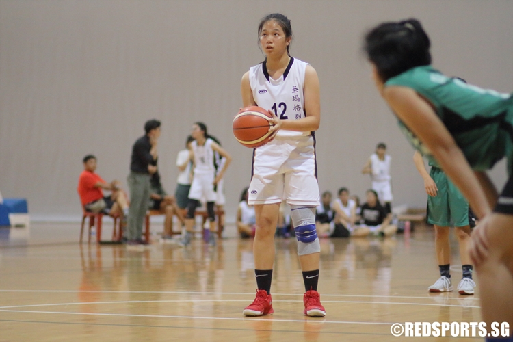 Faith Koh (SMS #12) at the free throw line against Anglican High. (Photo 3 © Dylan Chua/Red Sports)