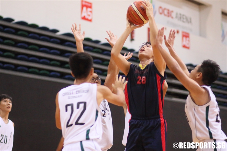 Xavier Tan (ACSB #28) shoots in the paint. He scored a game-high 16 points. (Photo 4 © Dylan Chua/Red Sports)