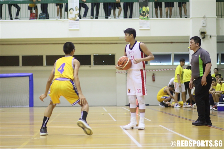 Dervin Leiroy Rajandhran (ACSB #11) looks for options on offense. He scored 19 points to lead his team in the final. (Photo 2 © Dylan Chua/Red Sports)