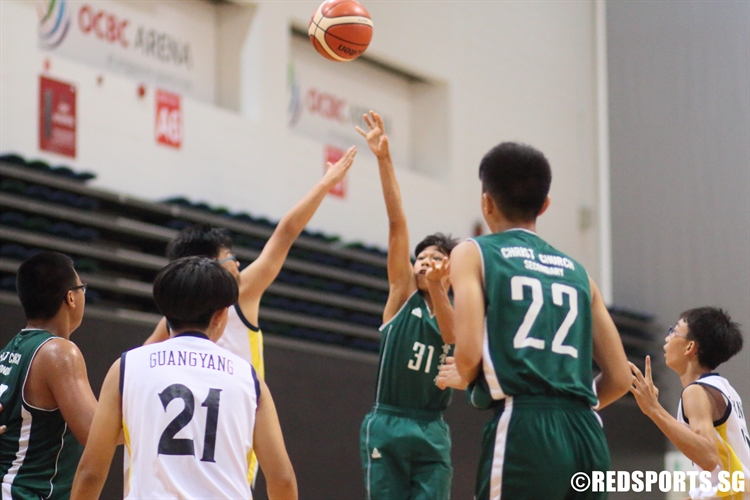 Robert Guile Fernandez Maranan (CHR #31) shoots a floater in the lane against Guangyang. (Photo 5 © Dylan Chua/Red Sports)