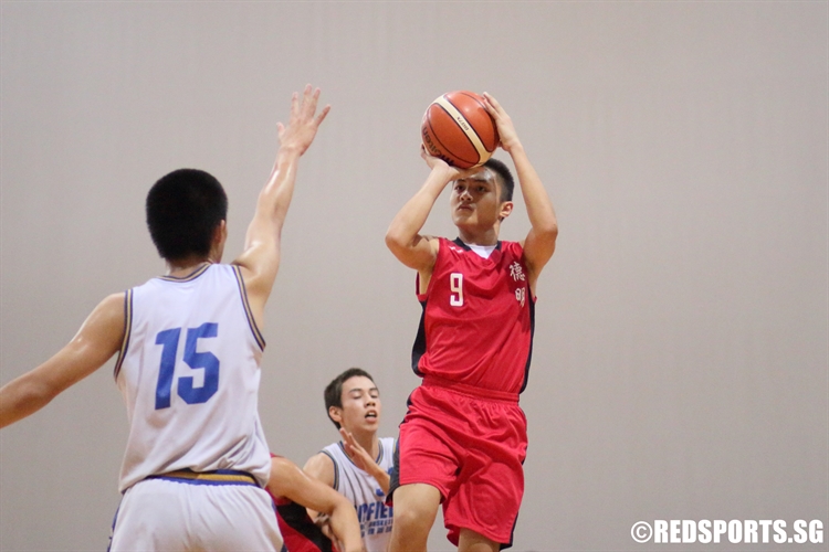 Liam Seth Israel (DMN #9) rises for a jumper over the defense. (Photo © Chan Hua Zheng/Red Sports)