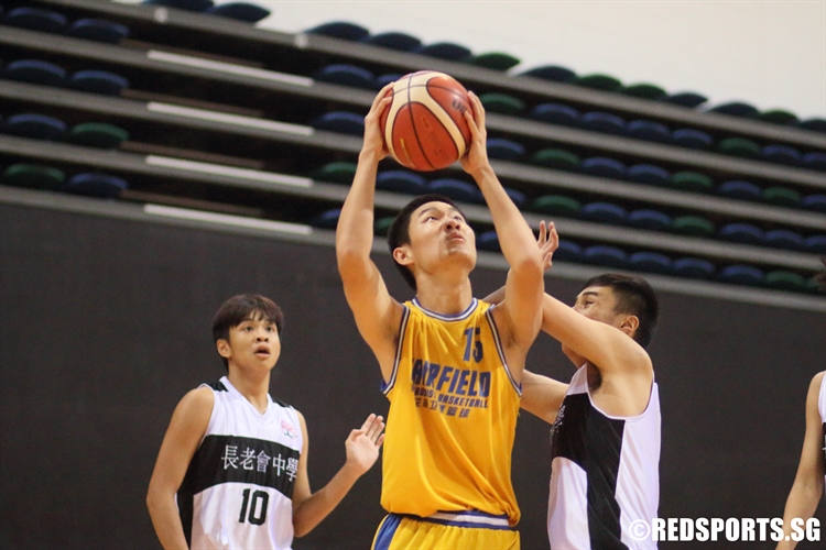 Jin Sheng De (FMS #15) takes aim from under the rim. (Photo 12 © Dylan Chua/Red Sports)