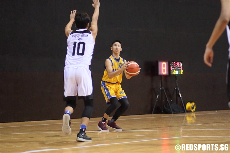 Russell Lim (FMS #12) squares up for three. The guard contributed a team-high 15 points. (Photo 3 © Dylan Chua/Red Sports)