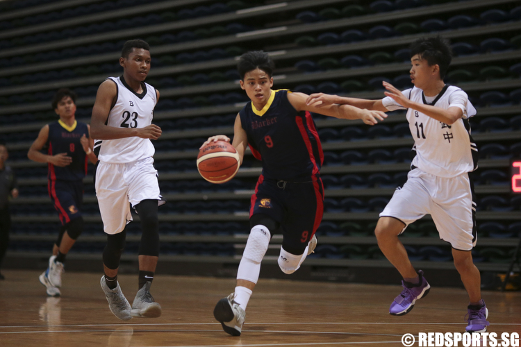 Cayman Miguel (#9) of ACS (Barker) drives against Bukit Panjang Govt. High. (Photo © Lee Jian Wei/Red Sports)