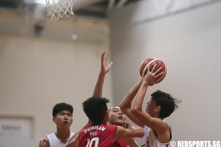 Brendon Hao (#35) of Christ Church Secondary shoots against Dunman Secondary. (Photo © Lee Jian Wei/Red Sports)