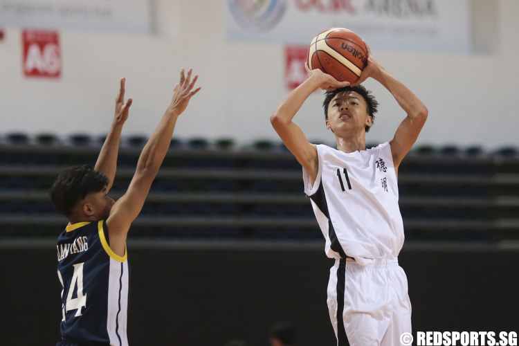 Moses Peh (#11) of Dunman Secondary shoots against Guang Yang Secondary. (Photo © Lee Jian Wei/Red Sports)