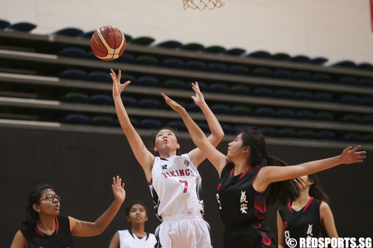 Lydia Ang (#7) of North Vista Secondary shoots a layup against (#6) of Ngee Ann Secondary. (Photo © Lee Jian Wei/Red Sports)