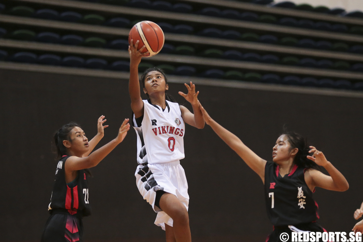 Haziqah (#0) of North Vista Secondary shoot a layup against Ngee Ann Secondary. (Photo © Lee Jian Wei/Red Sports)