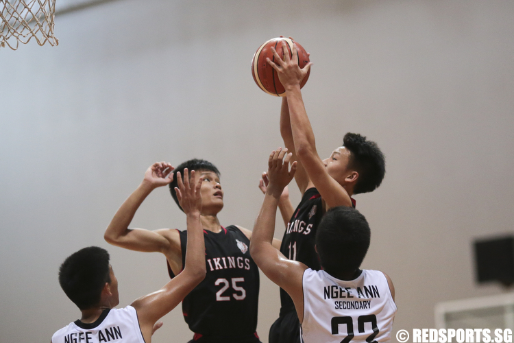 Justen Chiam (#11) of North Vista Secondary shoots against Ngee Ann Secondary. (Photo © Lee Jian Wei/Red Sports)