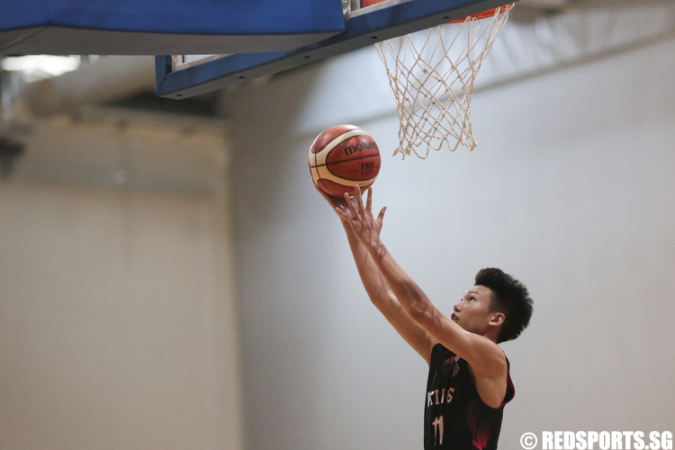Justen Chiam (#11) of North Vista Secondary shoots a layup against Ngee Ann Secondary. (Photo © Lee Jian Wei/Red Sports)