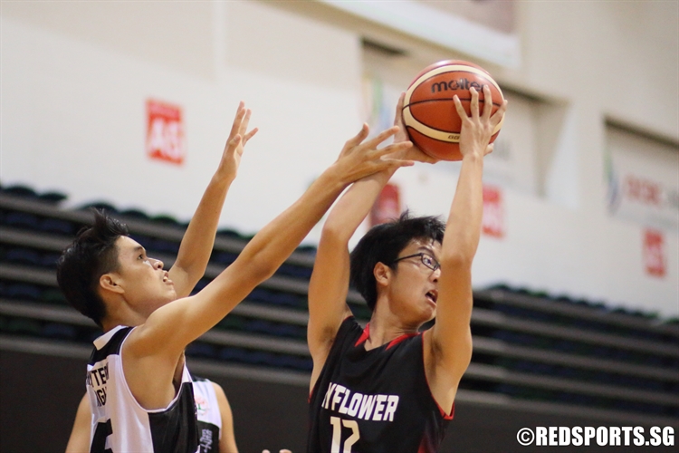 Teng Yan Siak (MF #12) grabs a offensive rebound against Presbyterian High. (Photo 13 © Dylan Chua/Red Sports)