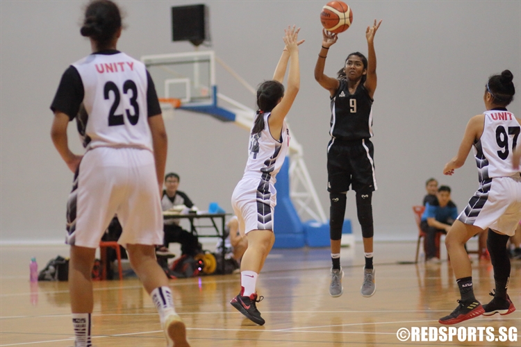 Crystal Nathasha (SCGS #9) shoots from beyond the arc. The SCGS forward scored a game-high 22 points against Unity. (Photo 1 © Dylan Chua/Red Sports)