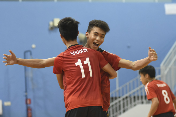 Zulfadli (SQS #7) celebrating a point with his teammate Lachlan (SQS #11) during the match. (Photo © Stefanus Ian/Red Sports)