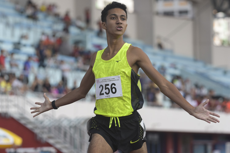 Syed Hussein Aljunied (#256) of Victoria Junior College celebrating his win during the A Division boys’ 1500m race. He finished with a time of 04:16.41s.. (Photo © Stefanus Ian).