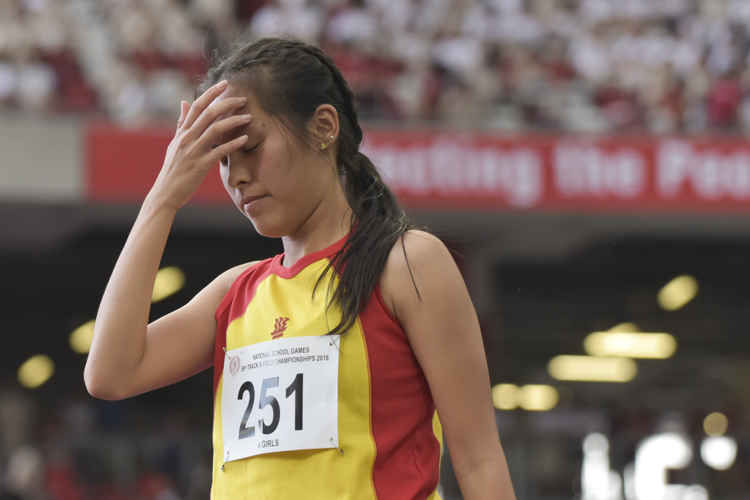 Jezebel Koh Xin Yun (#251) of Hwa Chong Institution reacting after one of her jumps. (Photo 1 © Stefanus Ian/Red Sports)