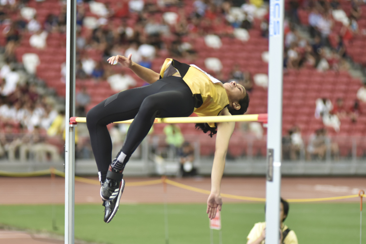 Fatimah Zahra Bte Mohd Rafique (#186) of Victoria Junior College  executing her winning jump of  1.56m.  (Photo © Stefanus Ian/Red Sports)