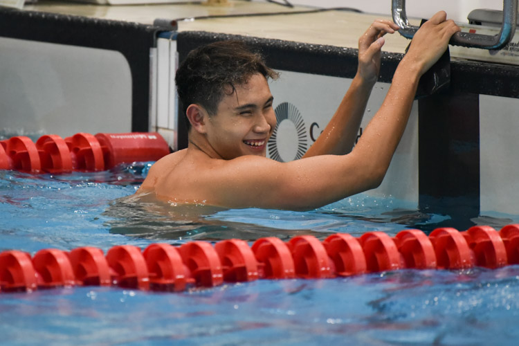 Gabriel Foo smiling after coming in first in the 50m Freestyle A Division Boys race with a time of 24.30s to break the meet record. (Photo © Stefanus Ian/Red Sports)