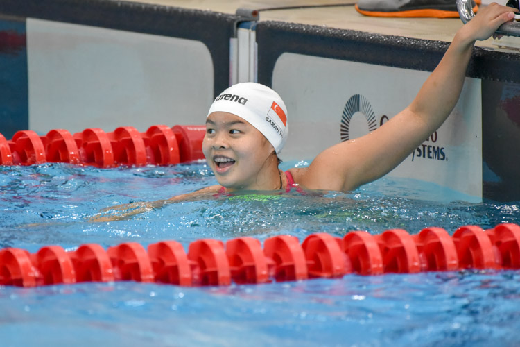 Sarah Yip smiling after coming in first in the 50m Freestyle B Division Girls race with a time of 26.51s. (Photo © Stefanus Ian/Red Sports)