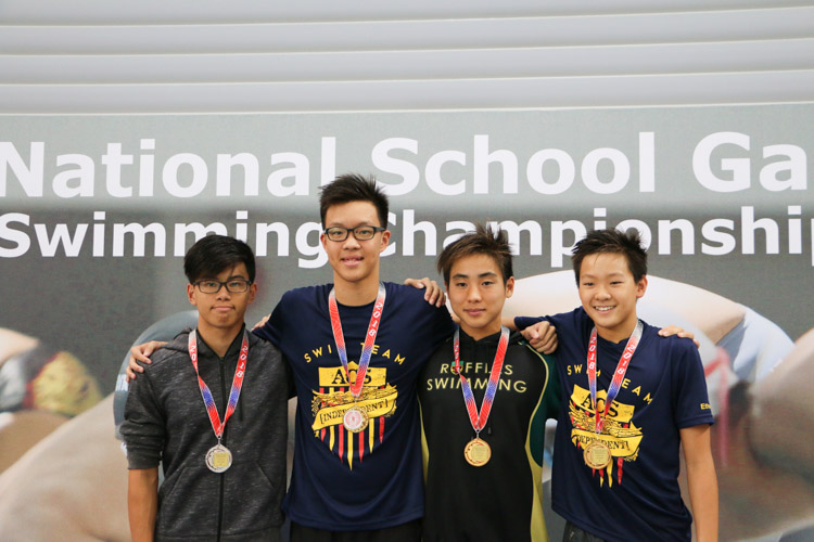 Medallists of the Boys 50m Butterfly B Division posing after the race. (Photo © Daniel Yeo/Red Sports)