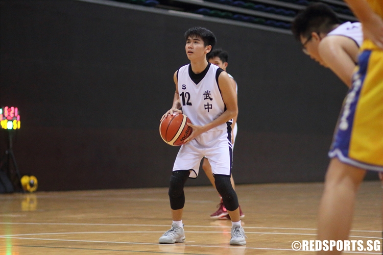 Jovan Chiam (BPGH #12) aims on a free-throw attempt. (Photo  © Chan Hua Zheng/Red Sports)
