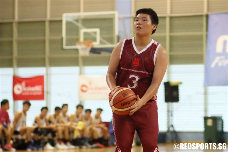 Lou Shiuan Wei (HCIS #3) lines up a free-throw attempt. (Photo  © Chan Hua Zheng/Red Sports)