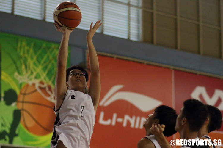 Lau Ming Han (IYJC #2) elevates for a underbasket shot off an offensive board. (Photo 8 © Dylan Chua/Red Sports)