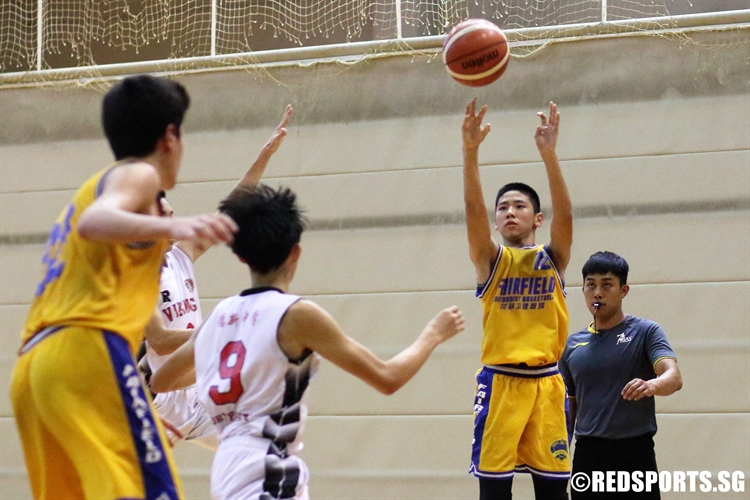 Russell Lim (FMS #12) shoots from three-point land. (Photo 9 © Dylan Chua/Red Sports)
