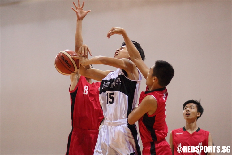 Jaron Ng (PHS #15) draws a foul on a shot attempt. (Photo  © Chan Hua Zheng/Red Sports)