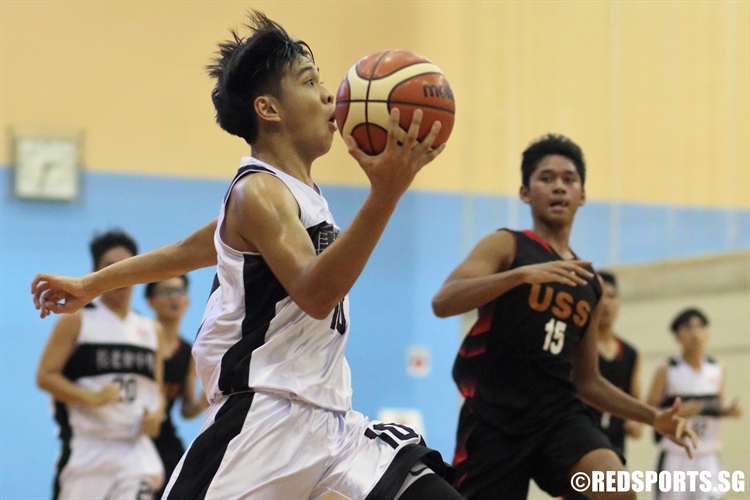 Tang Kah Wai (PHS #10) goes for a fast-break lay-up en route to a game-high 21 points. (Photo  © Chan Hua Zheng/Red Sports)