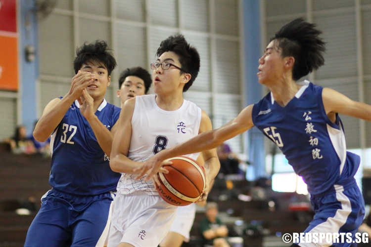 Bae Jongseong (RVHS #8) drives through the teeth of the defense. (Photo  © Chan Hua Zheng/Red Sports)