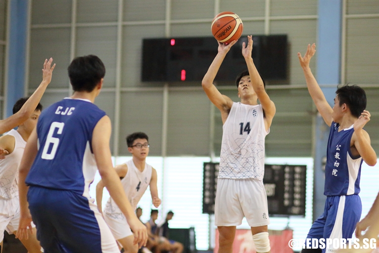 Ng Yi Da (RVHS #14) fires a three from the top of the key. (Photo  © Chan Hua Zheng/Red Sports)