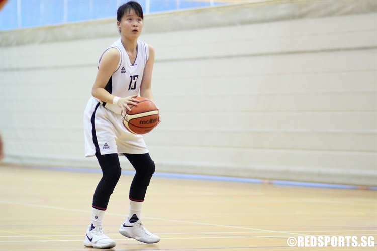Nur Nadia Bte Abdul Ghani (SCGS #13) at the free throw line. (Photo 10 © Dylan Chua/Red Sports)