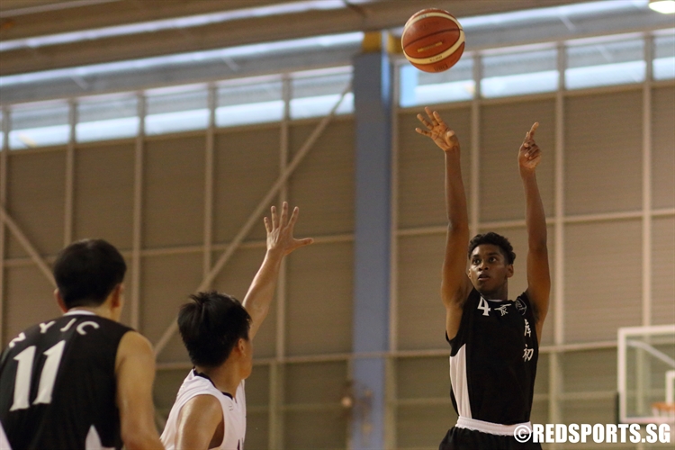Avinesh (NYJC #4) rises for a jump-shot over the defense. He finished with 10 points. (Photo  © Chan Hua Zheng/Red Sports)