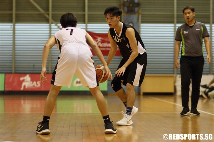 Wilbur Tan (NYJC #26) sizes up his defender as he looks to attack. (Photo  © Chan Hua Zheng/Red Sports)
