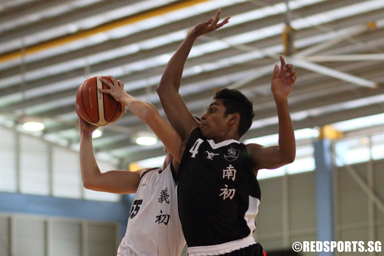 NYJC #4 rises for a block in transition. (Photo 6 © Dylan Chua/Red Sports)