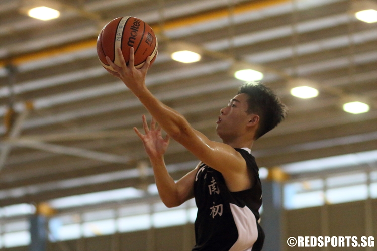 NYJC #26 goes for a lay-up in transition. He scored a game-high 10 points in the win. (Photo 1  © Dylan Chua/Red Sports)